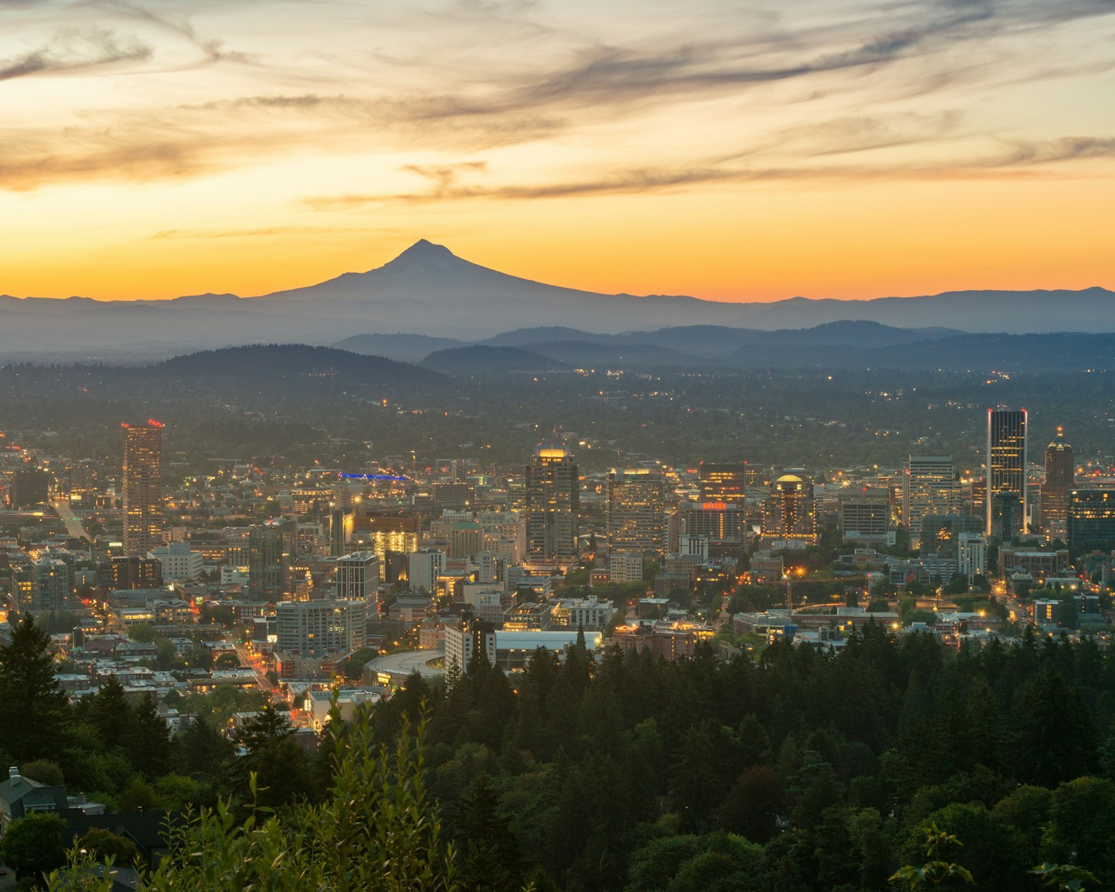 Portland, Oregon, at sunrise with Mount Hood on the horizon.